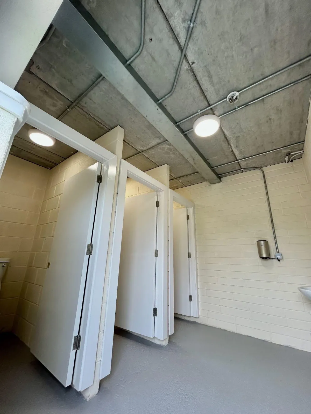 Commercial washroom lighting by Henry Deane Electrical