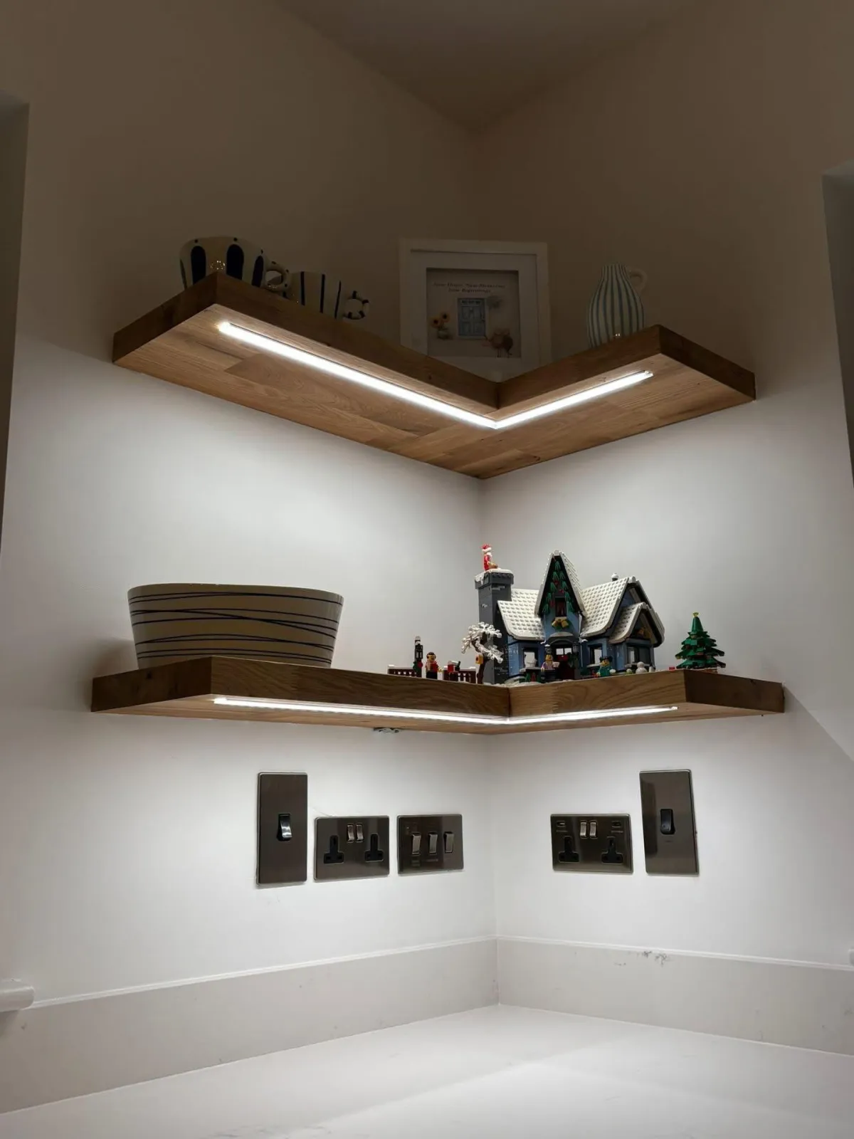 Feature shelf lighting and sockets by Henry Deane Electrical