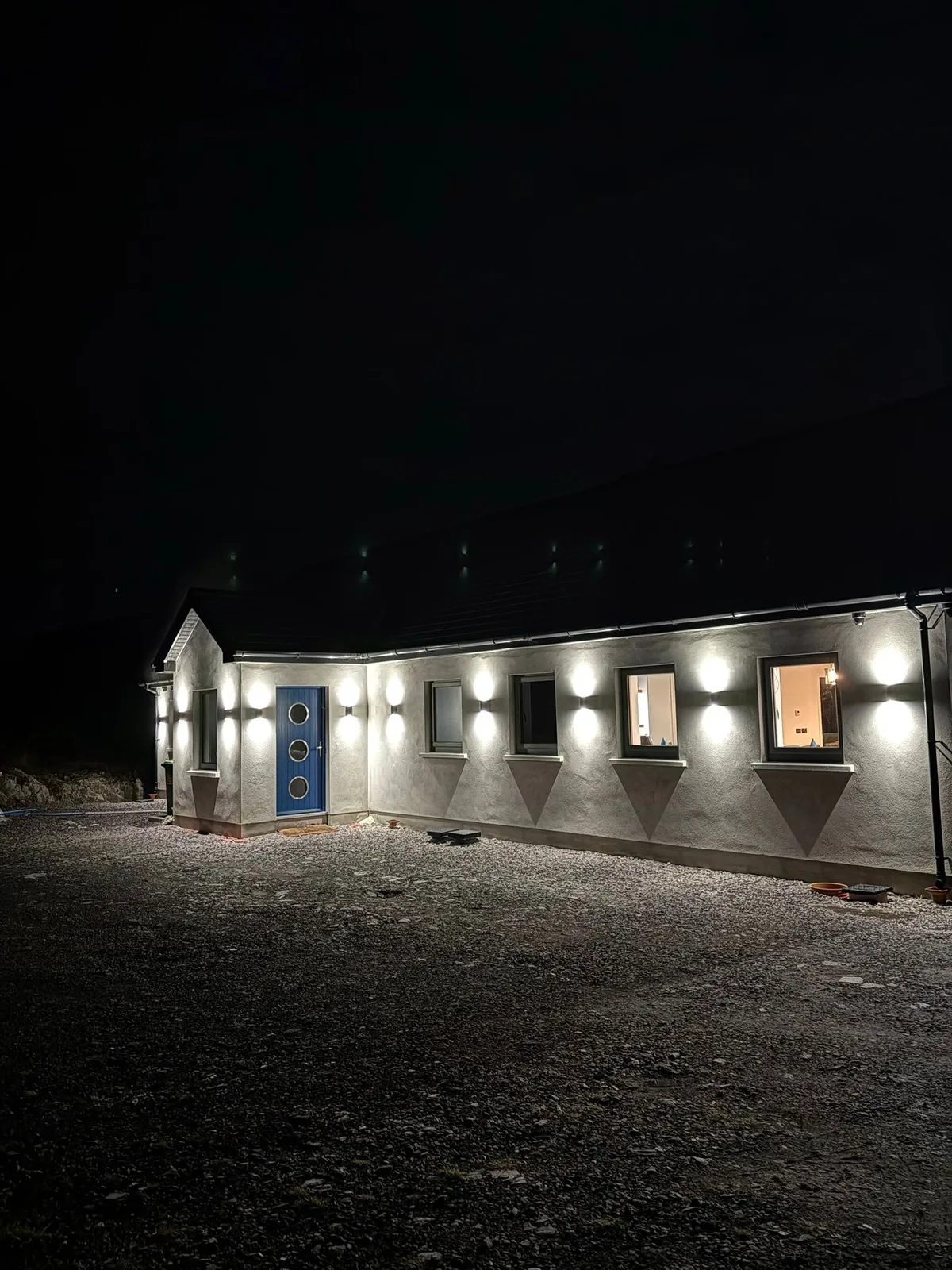 Exterior up/down wall lights on a Bantry new-build by Henry Deane Electrical